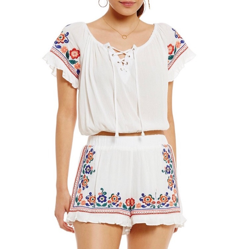 White ruffle set with embroidered flowers